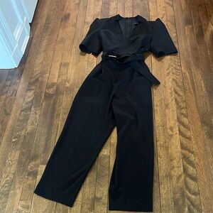 Petite black  belted  jumpsuit.  Never worn !